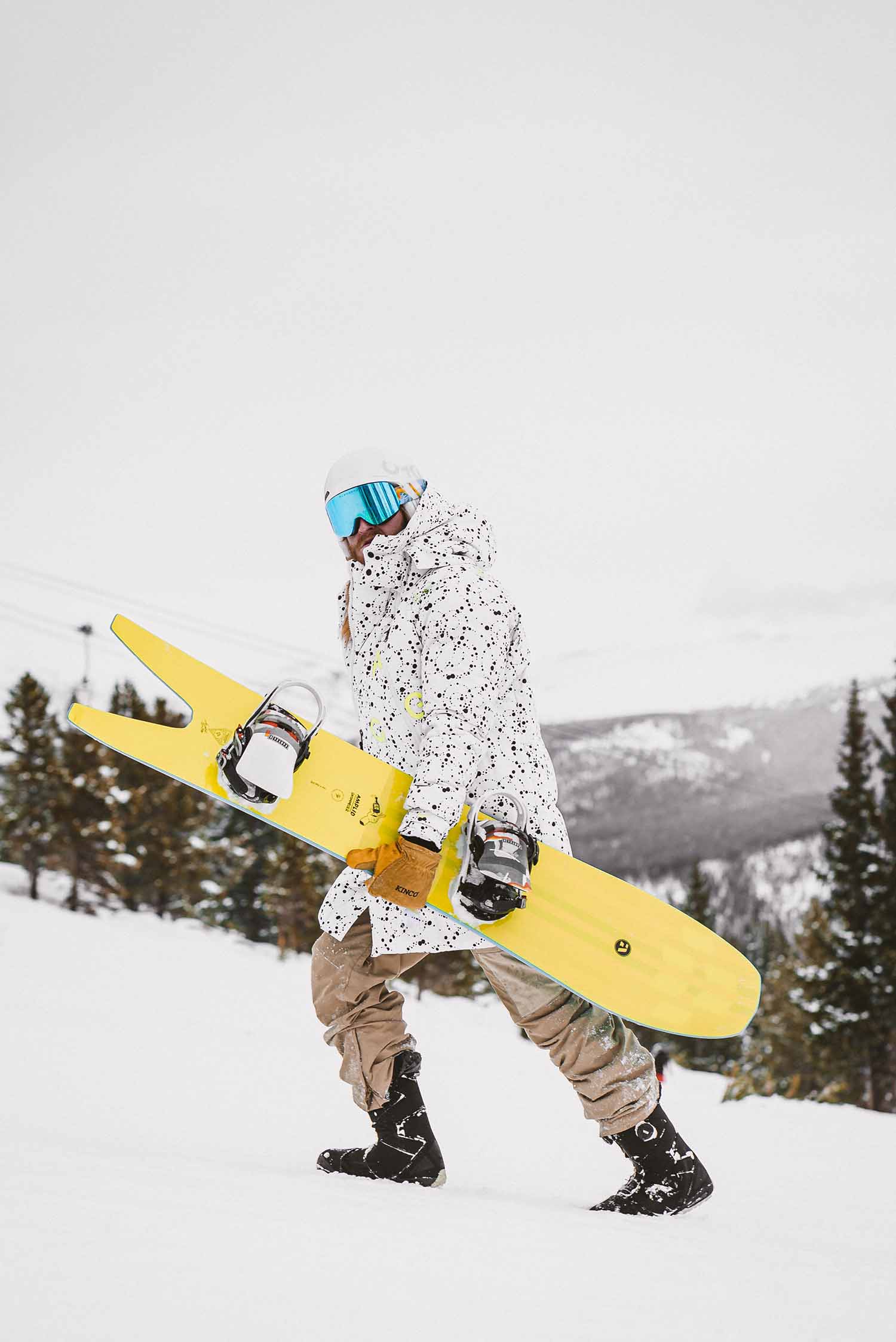 a person holding a snowboard